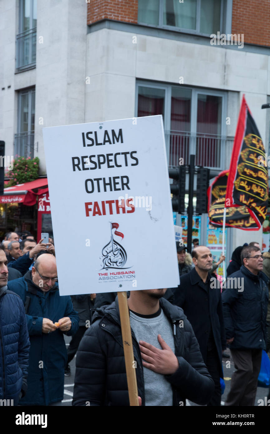 London, Großbritannien, 11th. November 2017. Tausende von Muslimen marschierten von Marble Arch nach Paddington Green über die Edgware Road mit Transparenten und Plakaten.die Plakate waren Parolen wie Männer und Frauen, die im islam gleich sind, Hussain die ewige Inspiration, vereint gegen Terrorismus, Nein zur Unterdrückung, Muslime vereint gegen Terrorismus, Hussain stand gegen den Terrorismus seiner Zeit. Hussain Ibn Ali war der Enkel des Propheten Muhammad. Kredit: Steve Bell/Alamy Live Nachrichten Stockfoto