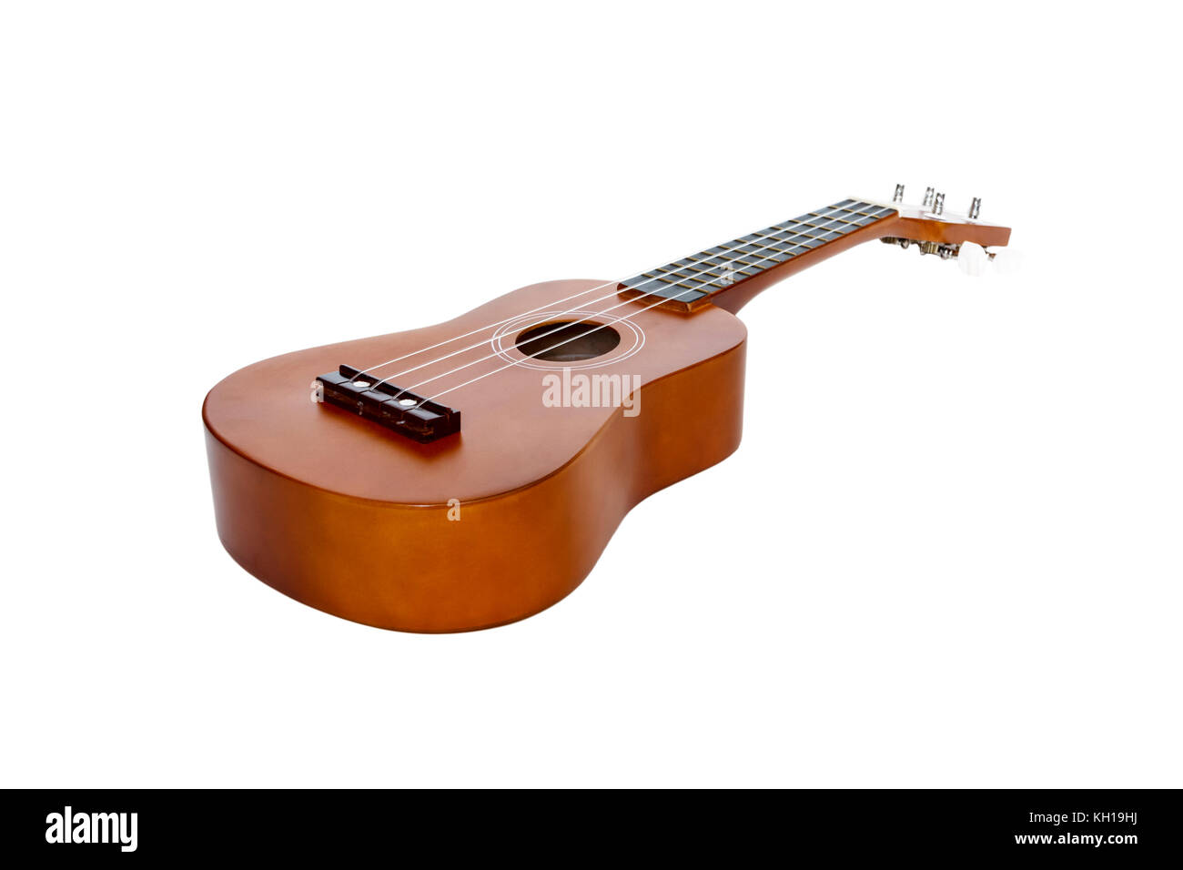 Ein natürliches Holz ukulele auf weißem Hintergrund Stockfoto