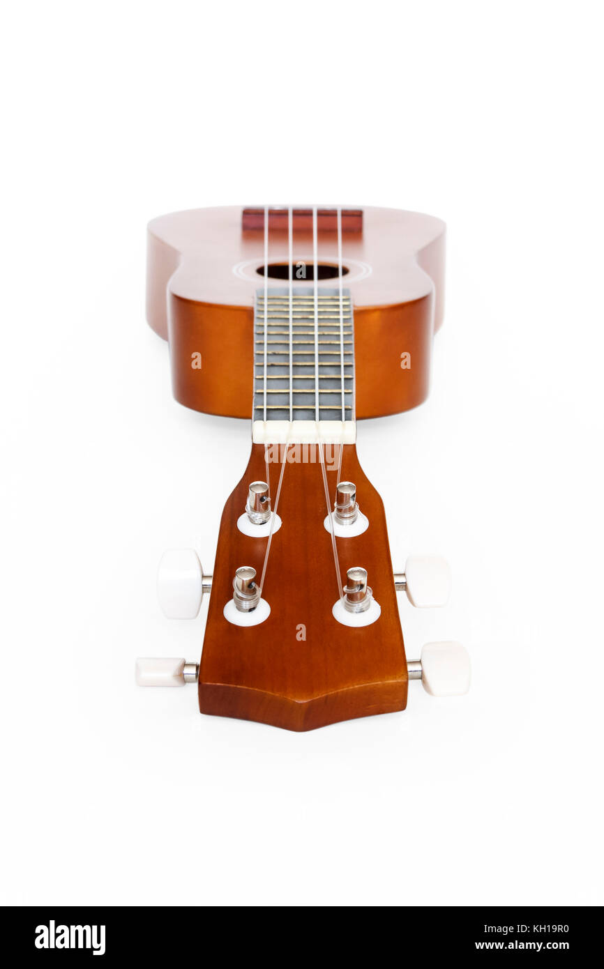 Ein natürliches Holz ukulele auf weißem Hintergrund Stockfoto