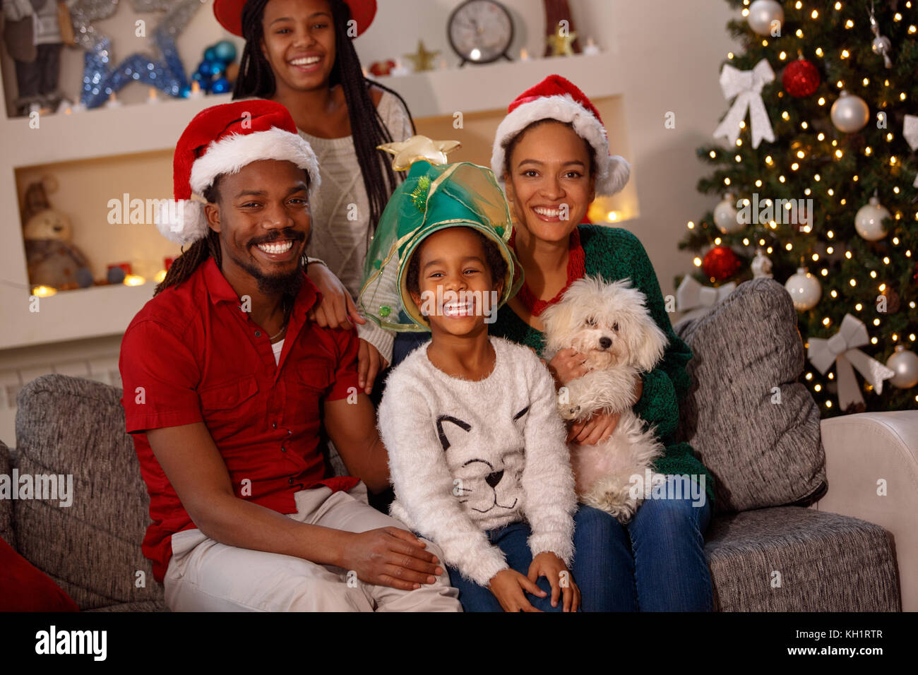 Portrait von Happy Family in santa Hüte auf Weihnachten Stockfoto