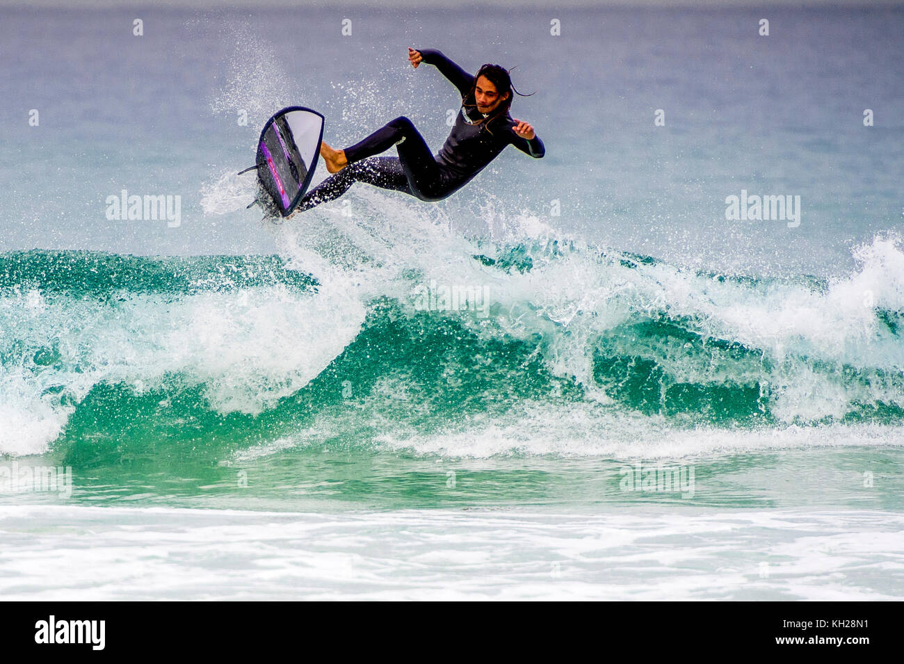 Epische bewegt sich durch ein Surfer auf einer kleinen Tag surfen am Bondi Beach, Sydney, NSW, Australien Stockfoto