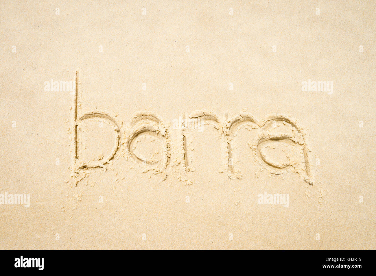 Barra, einer Gegend am Strand von Rio de Janeiro, Nachricht handschriftlich auf glatten Sandstrand Brasilien Stockfoto