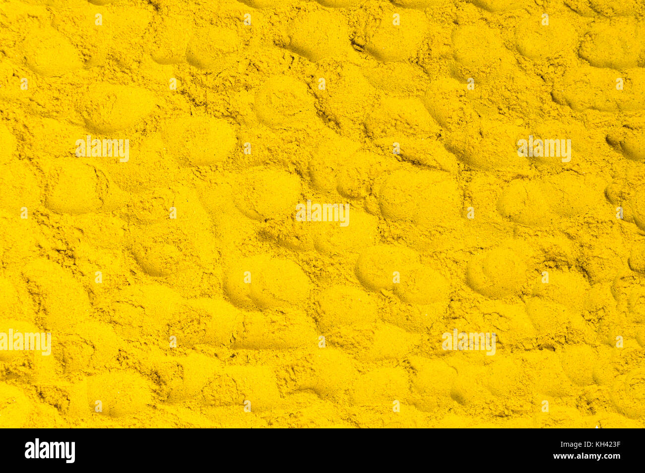 Curry Pulver gelb Stapel bilden ein Hintergrundmuster Stockfoto