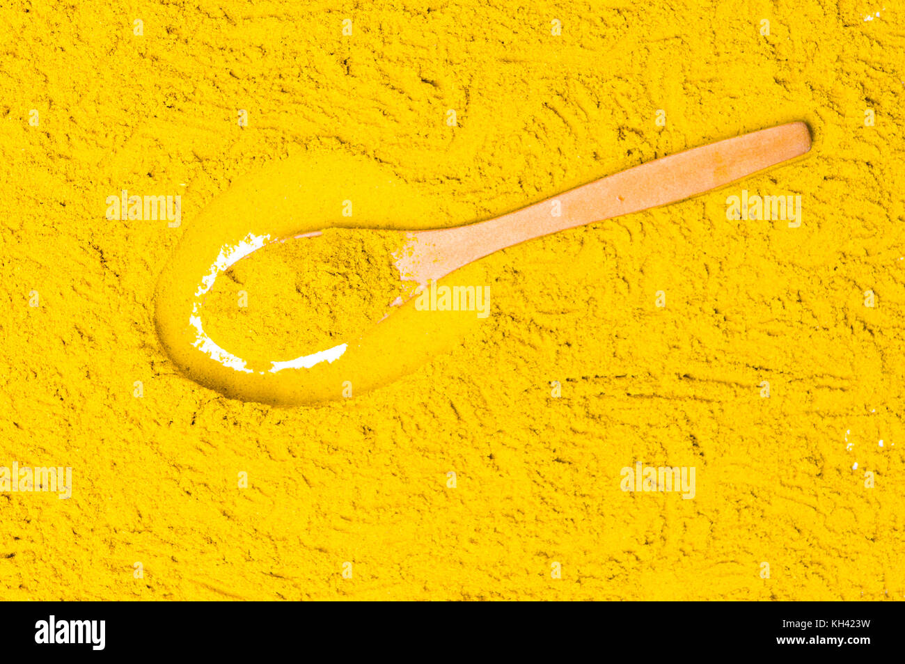 Curry Pulver gelb Stapel bilden ein Hintergrundmuster Stockfoto