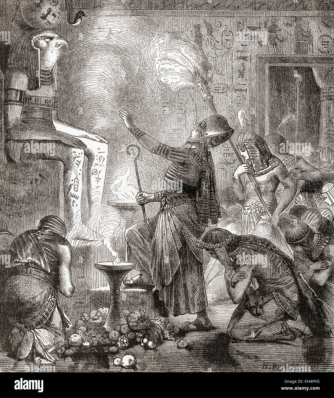 Ein ägyptischer König, der Gott Horus in einem Tempel anbetet. Aus Ward and Lock's Illustrated History of the World, veröffentlicht um 1882. Stockfoto