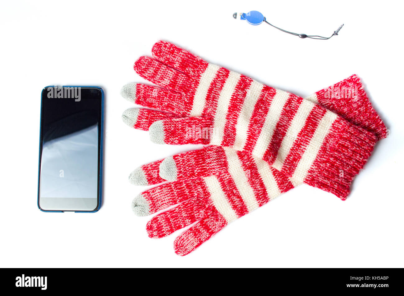 Gewebt rot Touchscreen winter handschuhe Weiß isoliert Stockfoto