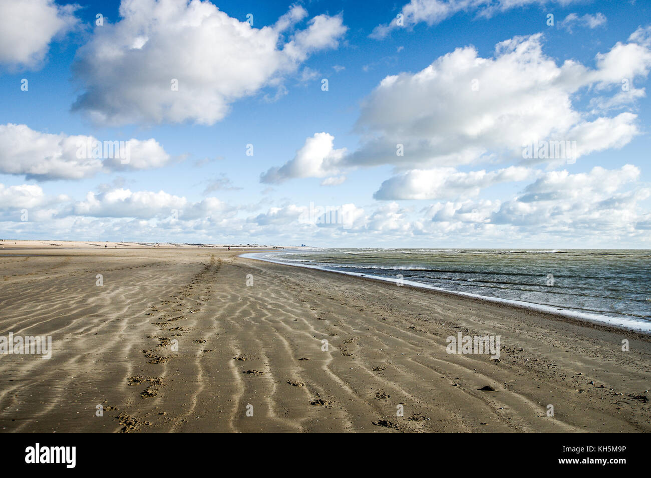 Sand Abblasen der Strand bei Ebbe - Camber Sands, East Sussex, England Stockfoto