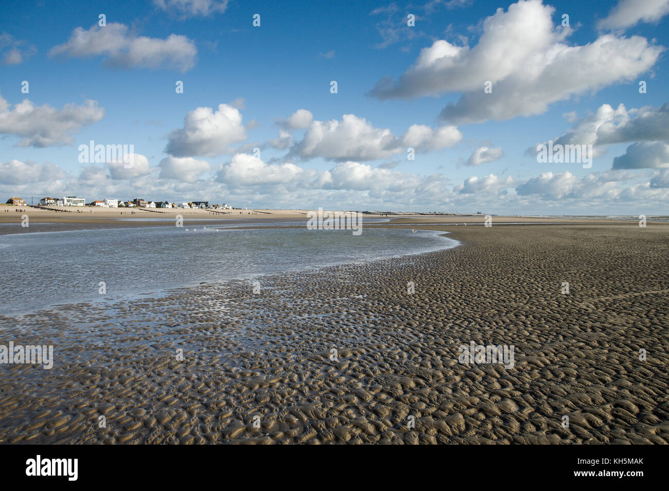 Ebbe Wattenmeer bei Camber Sands Beach in East Sussex Stockfoto