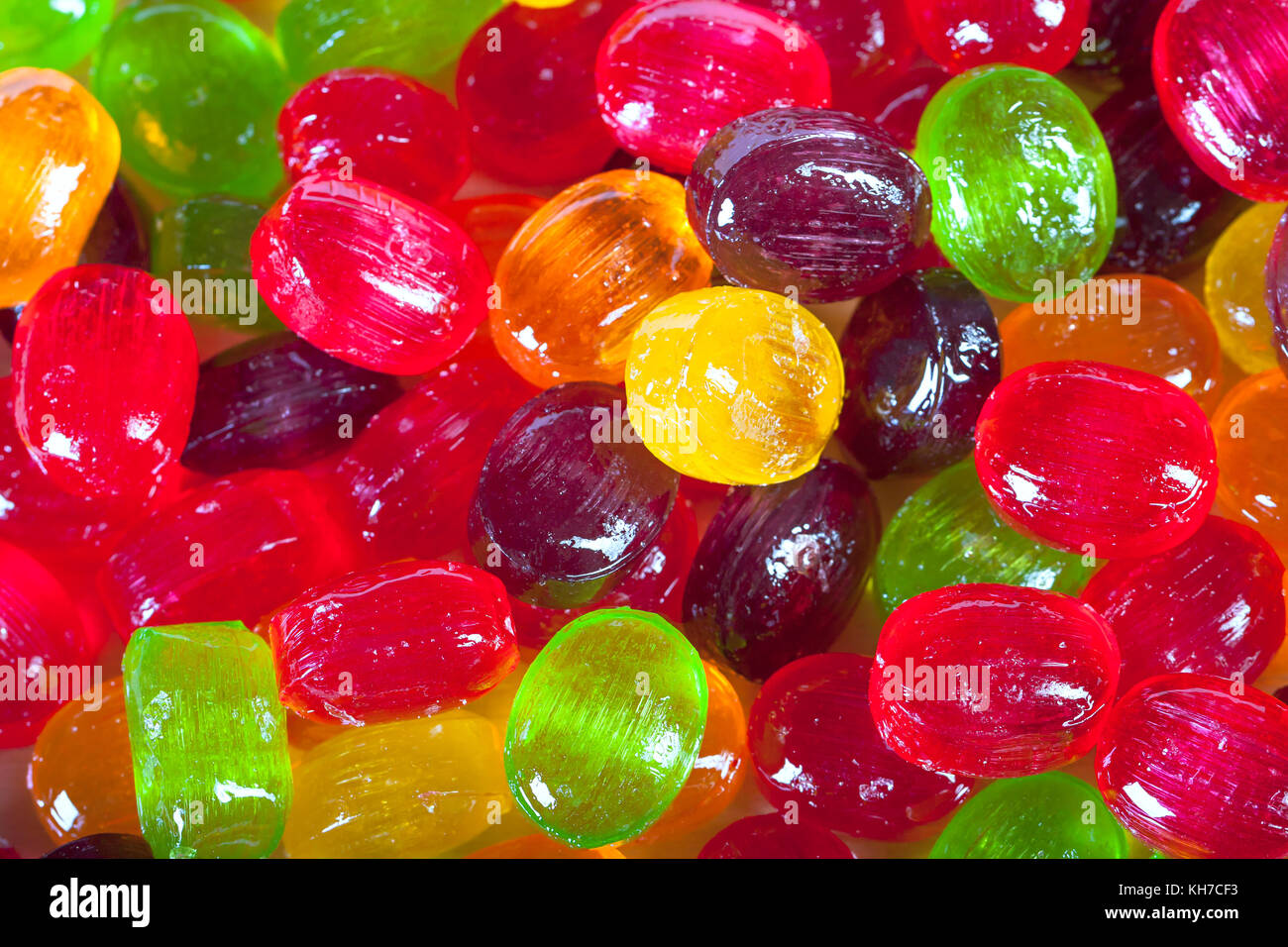 Hintergrund von bunten Süßigkeiten Zucker Süßigkeiten. farbige Süßigkeiten Nahaufnahme Stockfoto