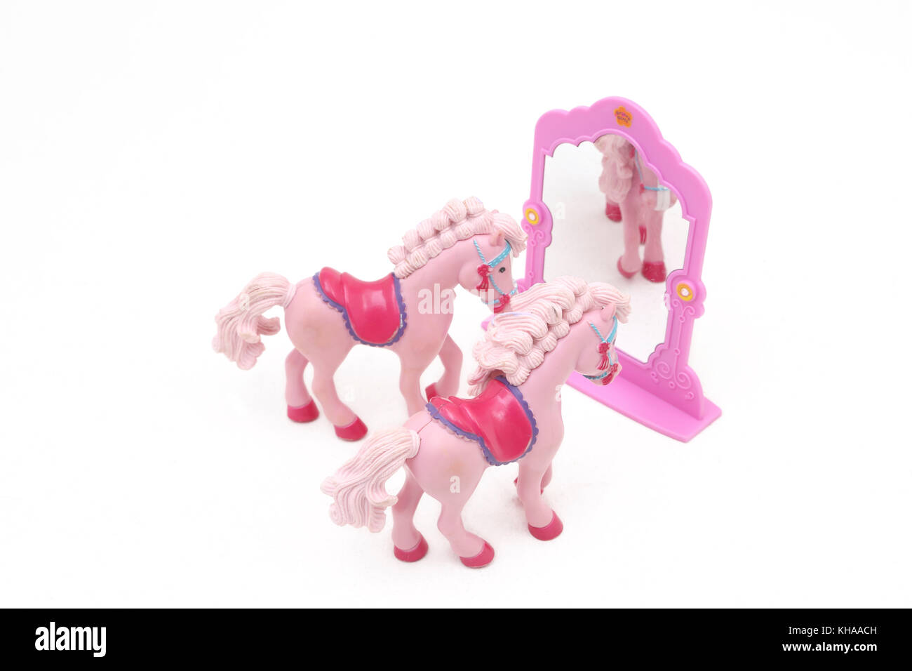 Spielzeug grooviger Mädchen Pferde und Spiegel Stockfoto