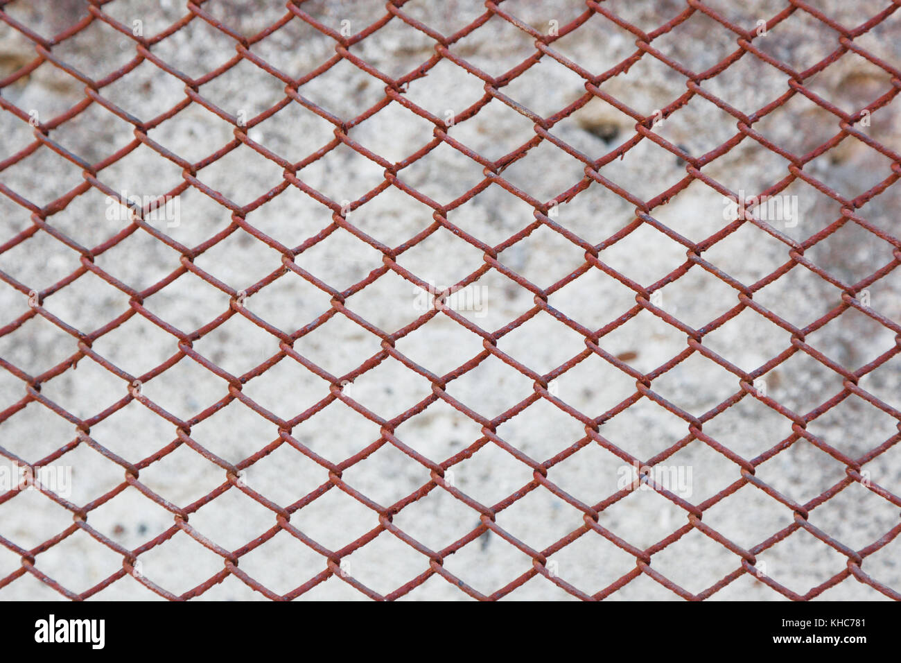 Rostiger Zaun von Farbe metal mesh Hintergrund Stockfoto