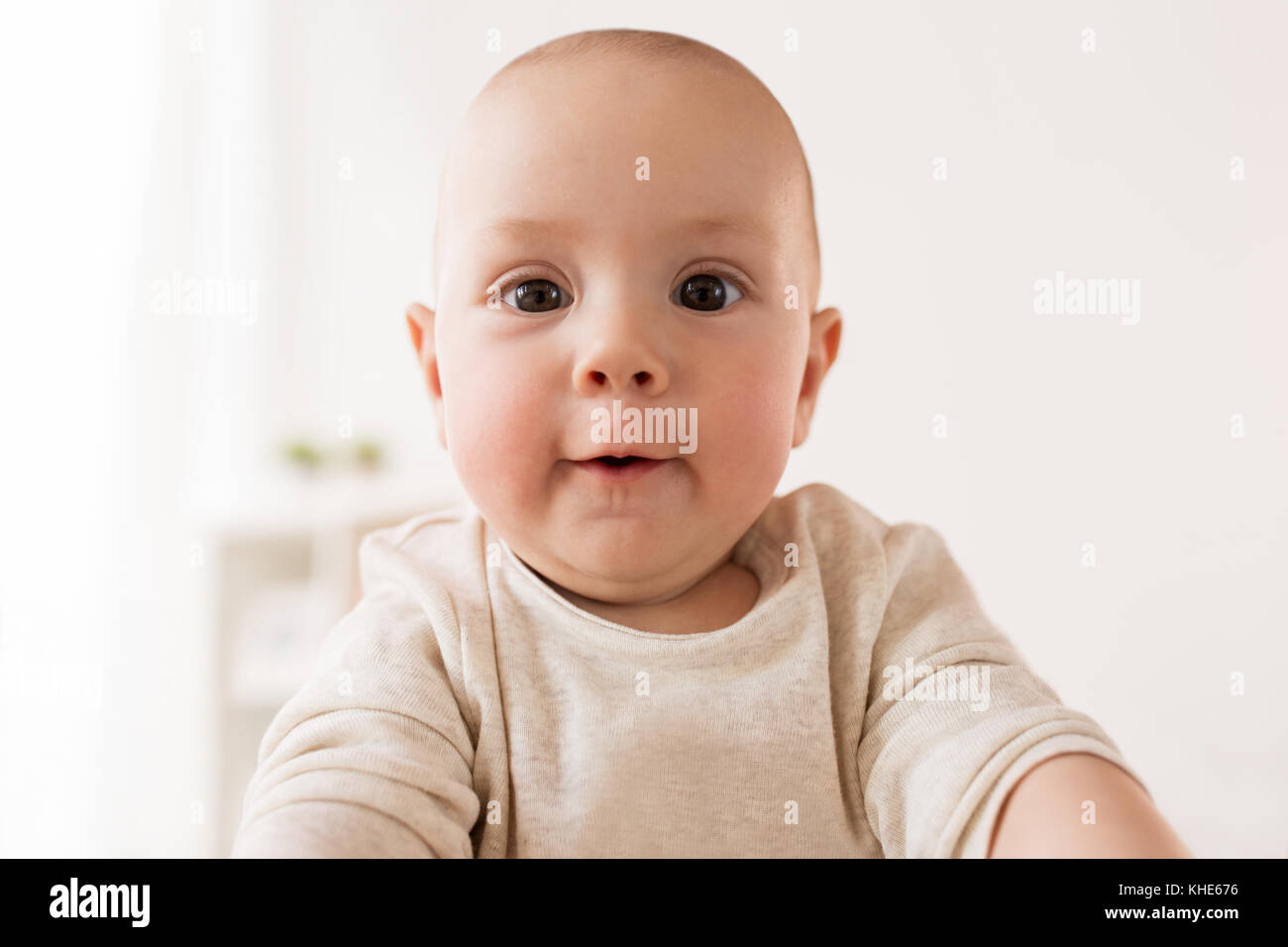 Nahaufnahme der glücklichen kleinen Baby Junge Gesicht Stockfoto