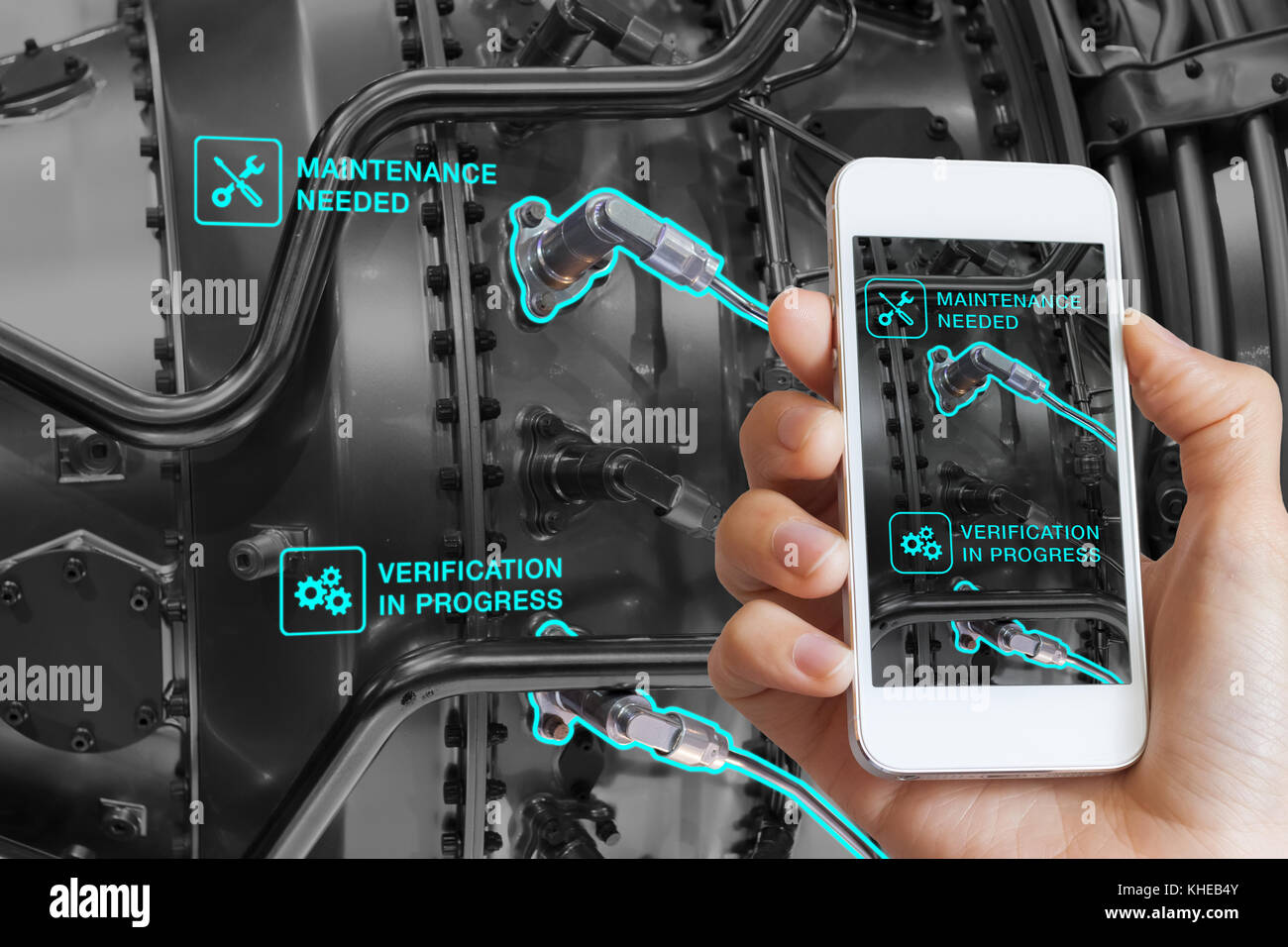 Augmented Reality Technologie Wartung und Service von mechanischen Teilen, Techniker mit Smartphone mit AR-Schnittstelle auf dem Bildschirm in smart Industrie, ein Stockfoto