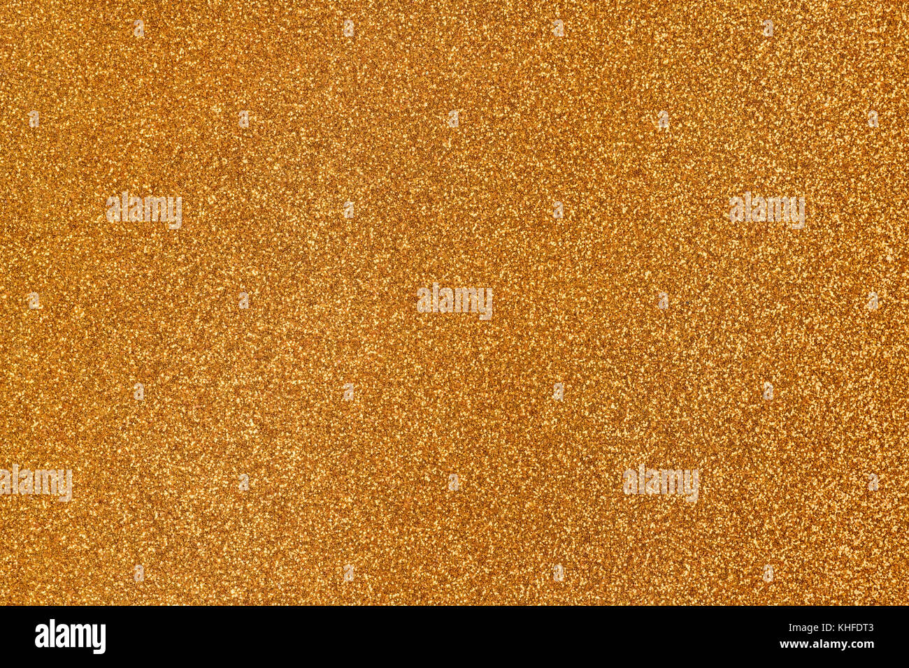Golden glitter Oberfläche schließen. Textur und Hintergrund Stockfoto