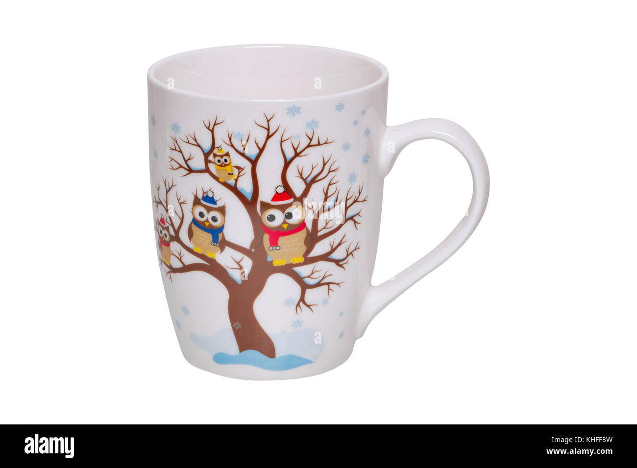 Becher mit Eulen auf dem Baum auf weißem Hintergrund Stockfoto