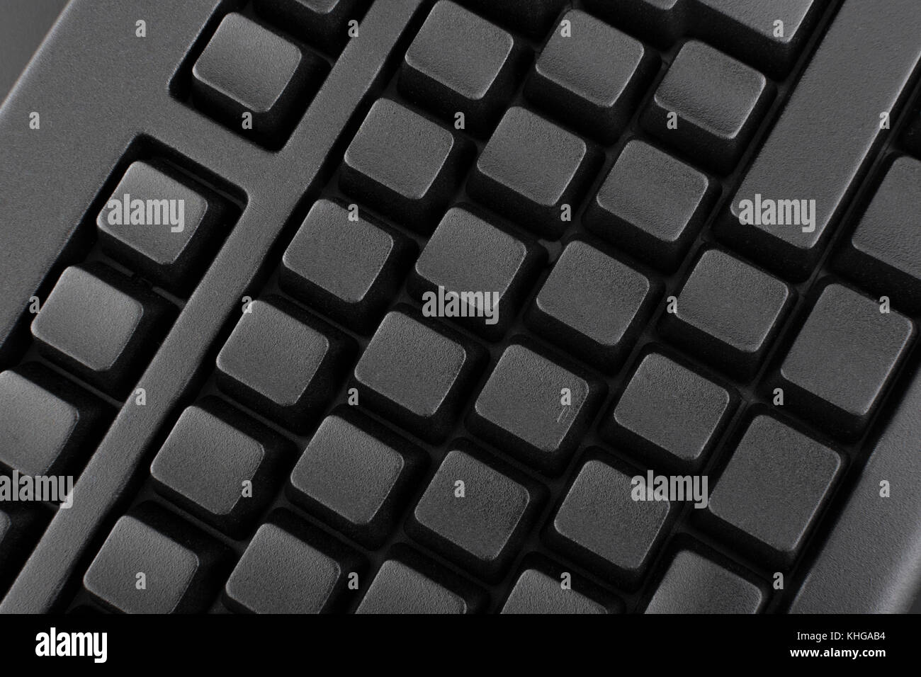 Schwarze Tastatur mit Blindfarbe QWERTY. Für Dateneingabe, E-Mail und Datenschutz, Darkweb, Daten-Cyberangriff, Technologiediebstahl in China, Cyber-Bedrohung, Hacktivismus Stockfoto