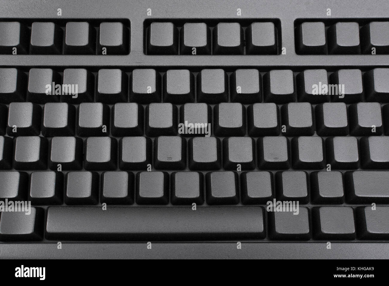 Schwarze Tastatur mit Blindfarbe QWERTY. Für Dateneingabe, E-Mail und Datenschutz, Darkweb, Daten-Cyberangriff, Technologiediebstahl in China, Cyber-Bedrohung, Hacktivismus Stockfoto