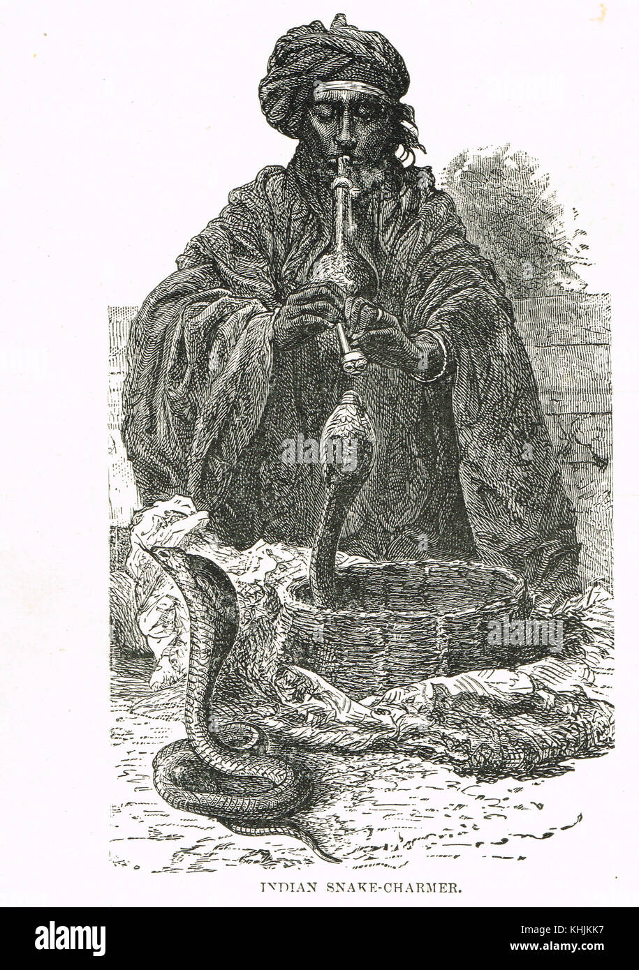 Ein indischer Schlangenbeschwörer aus dem 19. Jahrhundert Stockfoto