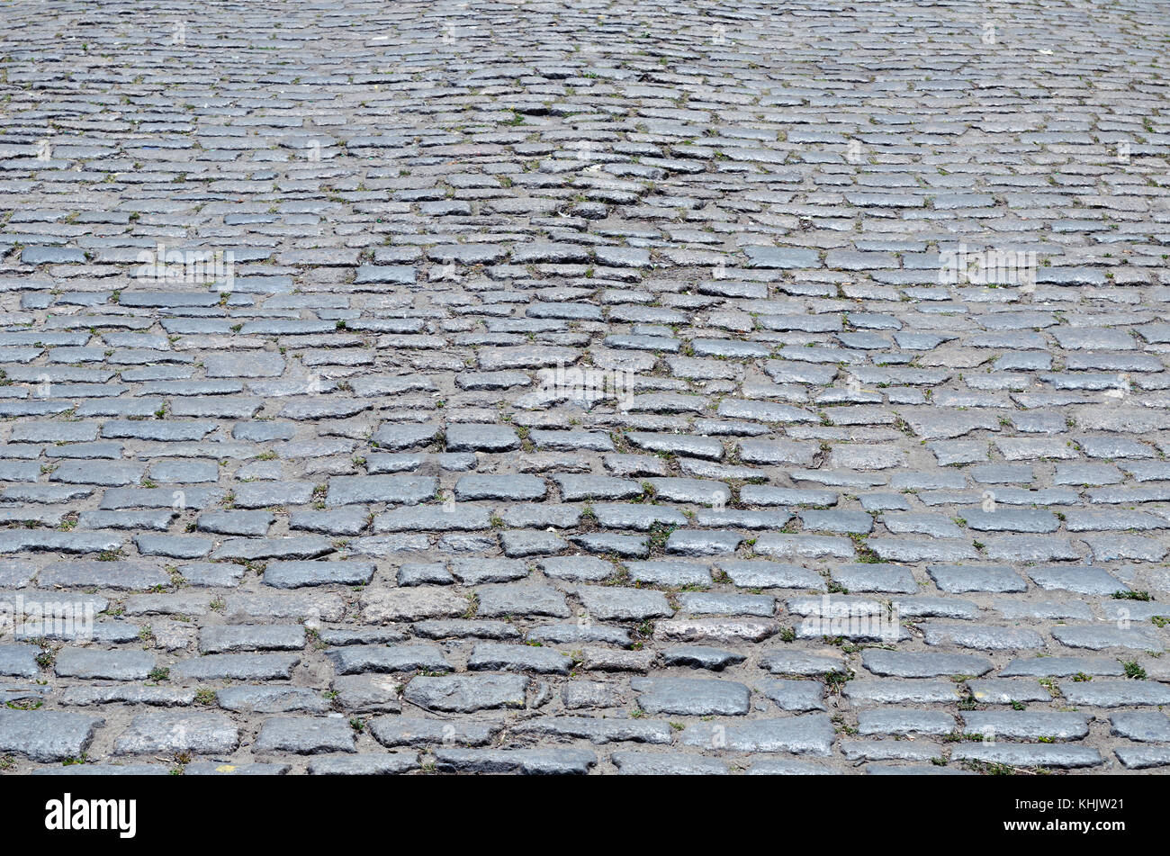 Pflastersteine auf der Straße als Hintergrund Stockfoto
