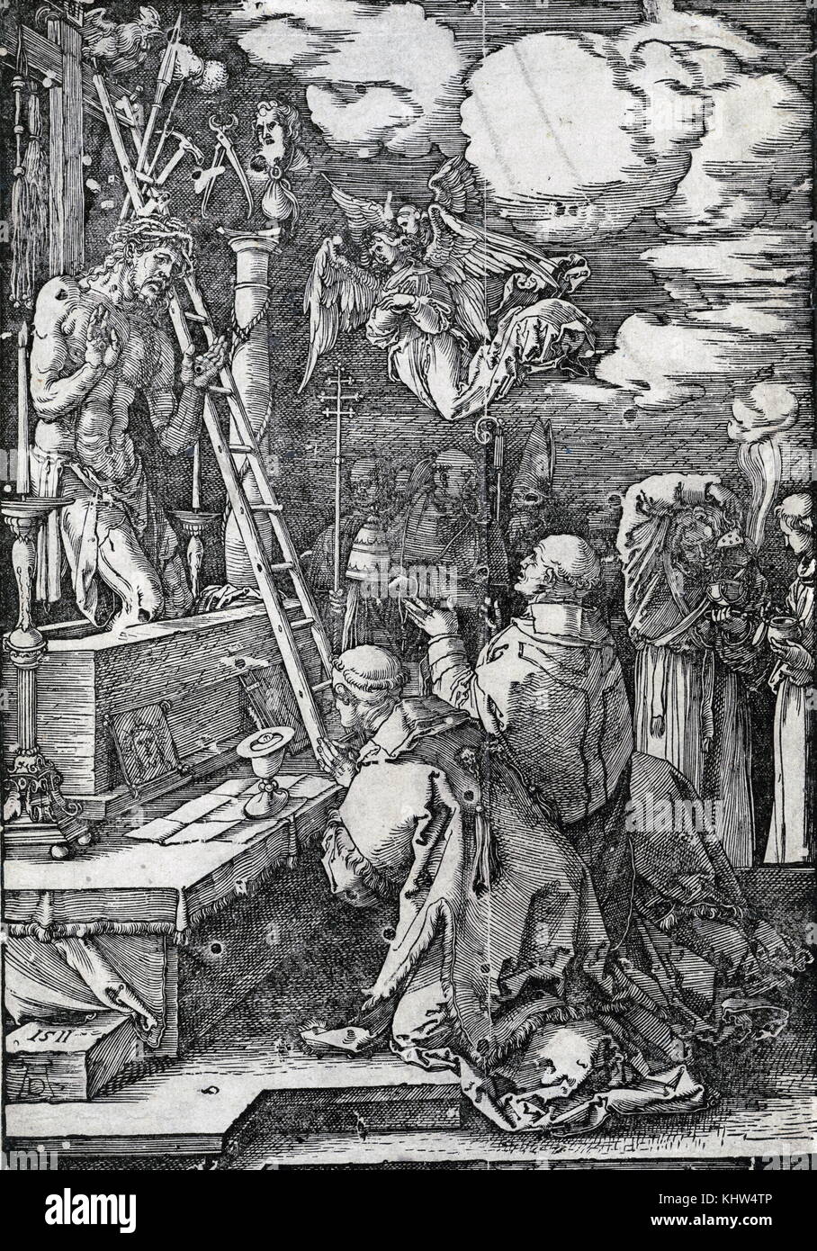 Gravur mit dem Titel "Die Messe des heiligen Gregor' Darstellung des gekreuzigten Christus, die auf einen Altar an Papst Gregor den Großen. Vom 16. Jahrhundert Stockfoto