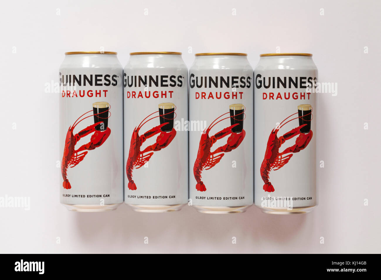Guinness Draught - Limited Edition Guinness Dosen mit kultigen John gilroy's Hummer Artwork - vier Dosen auf weißem Hintergrund auf ads auf der Grundlage Stockfoto