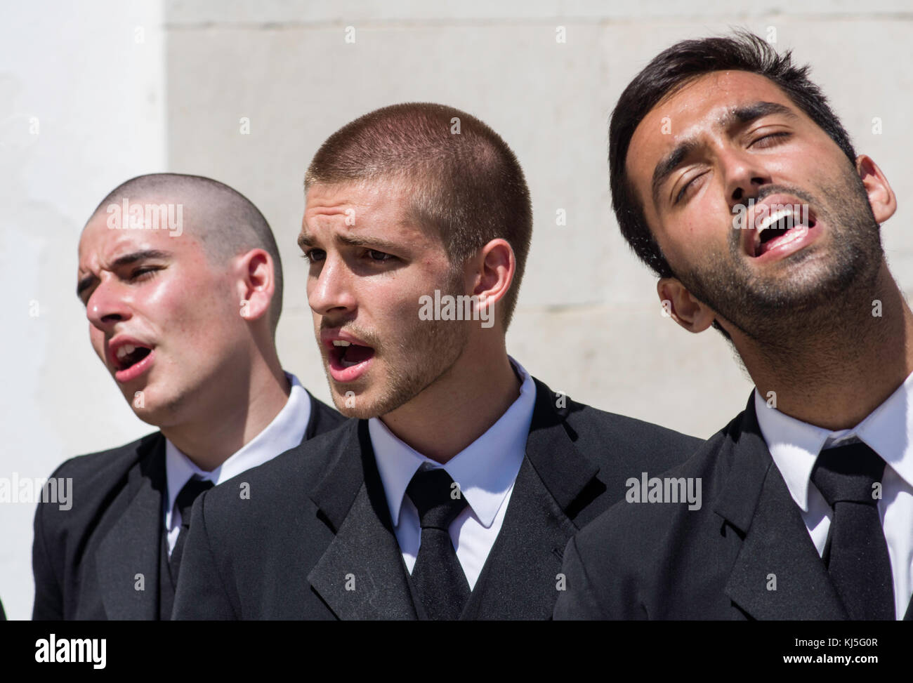 Studenten Zeichen für Münzen, die an der Universität von Coimbra, Portugal Stockfoto