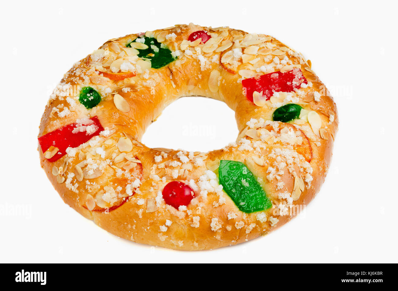 König Kuchen oder roscon de Reyes auf weißem Hintergrund. Spanisch typische Dessert der Erscheinung des Herrn Stockfoto