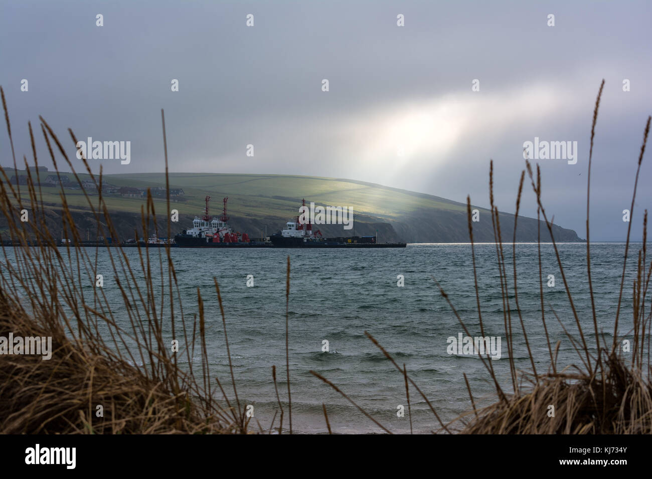 Wellen von Licht in Scapa, Orkney Stockfoto