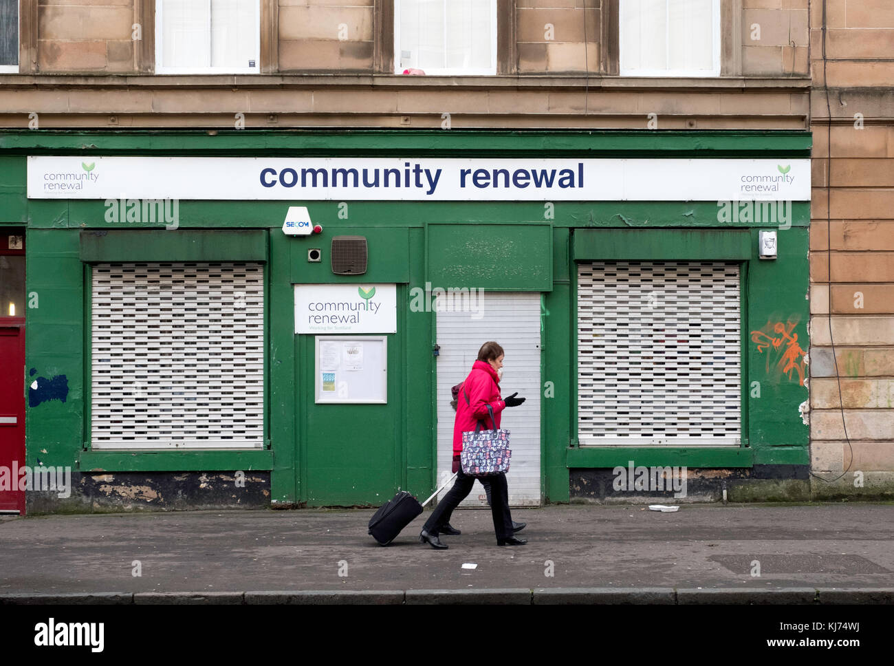 Kleine shuttered Shop, gemeinschaftlicher Erneuerung, in Govanhill District von Glasgow, Schottland, Vereinigtes Königreich. Stockfoto