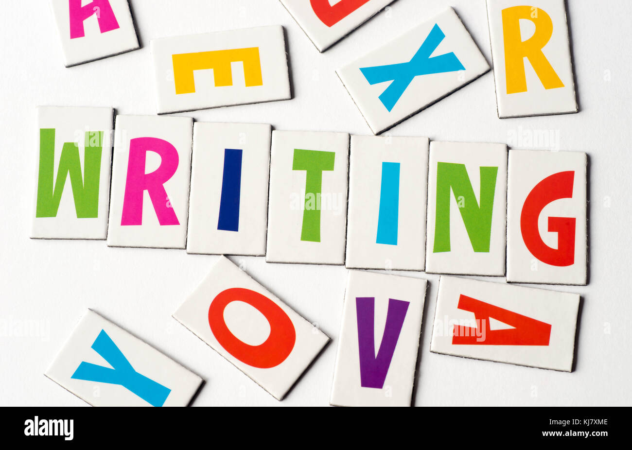 Wort schreiben aus bunte Buchstaben auf weißem Hintergrund Stockfoto