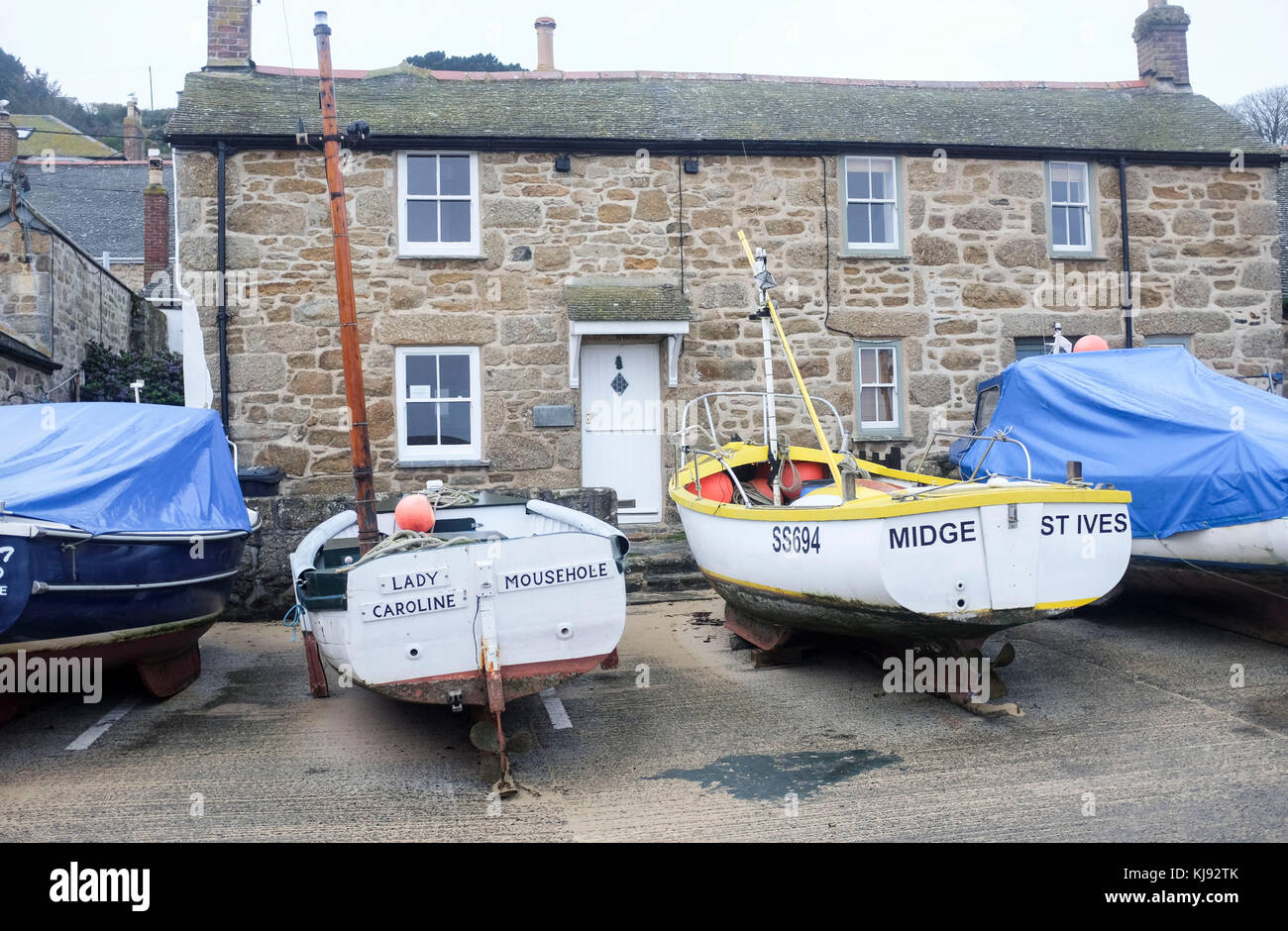 Das kleine Fischerdorf und Hafen von Mousehole auf der Cornwall Coast UK Stockfoto