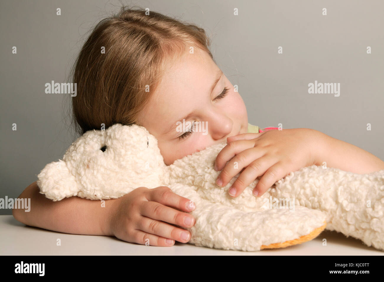 Baby mit Teddybär Stockfoto