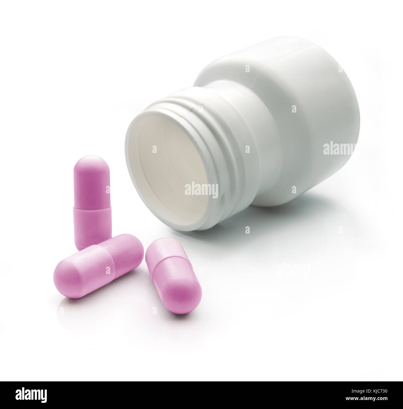 Rosa Pillen und weißen Topf vor weißem Hintergrund mit weichen Schatten. weiches Licht und leicht weich konzentrieren. Freistellungspfad Stockfoto
