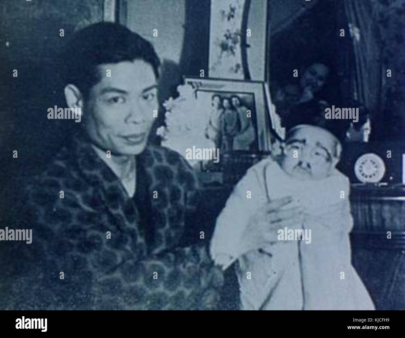 Bruce Lee mit seinem Vater 1940 s Stockfoto