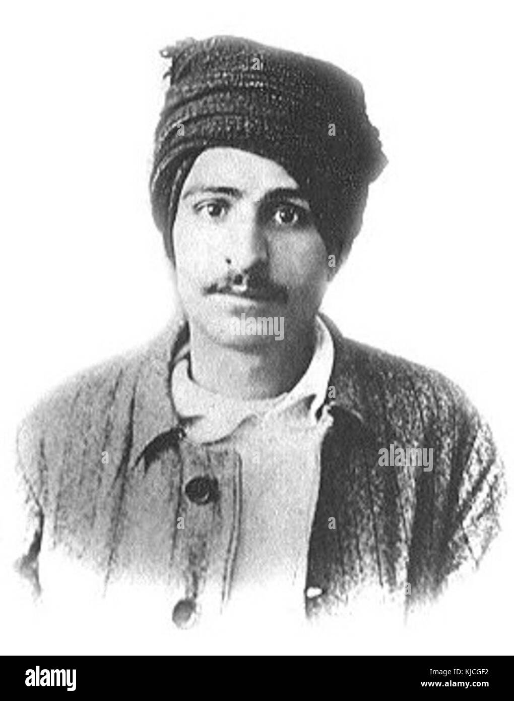 Porträt von Meher Baba, einem einflussreichen spirituellen Führer, der einen Turban trägt. Das Foto fängt sein unverwechselbares Aussehen ein, ein wichtiges visuelles Element seiner öffentlichen Persönlichkeit während seines Lebens im 20. Jahrhundert. Stockfoto