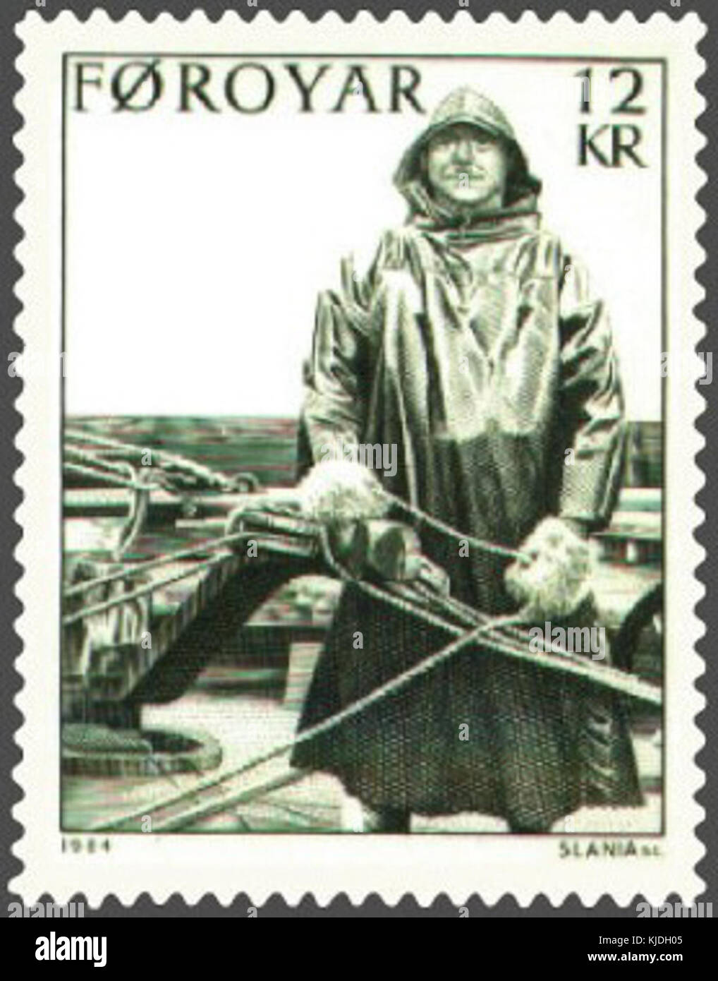 Ein Stempel der Färöer mit einem Bild eines Steuermanns, das die maritime Kultur und das Erbe der Insel darstellt, mit Schwerpunkt auf der nautischen Geschichte. Stockfoto