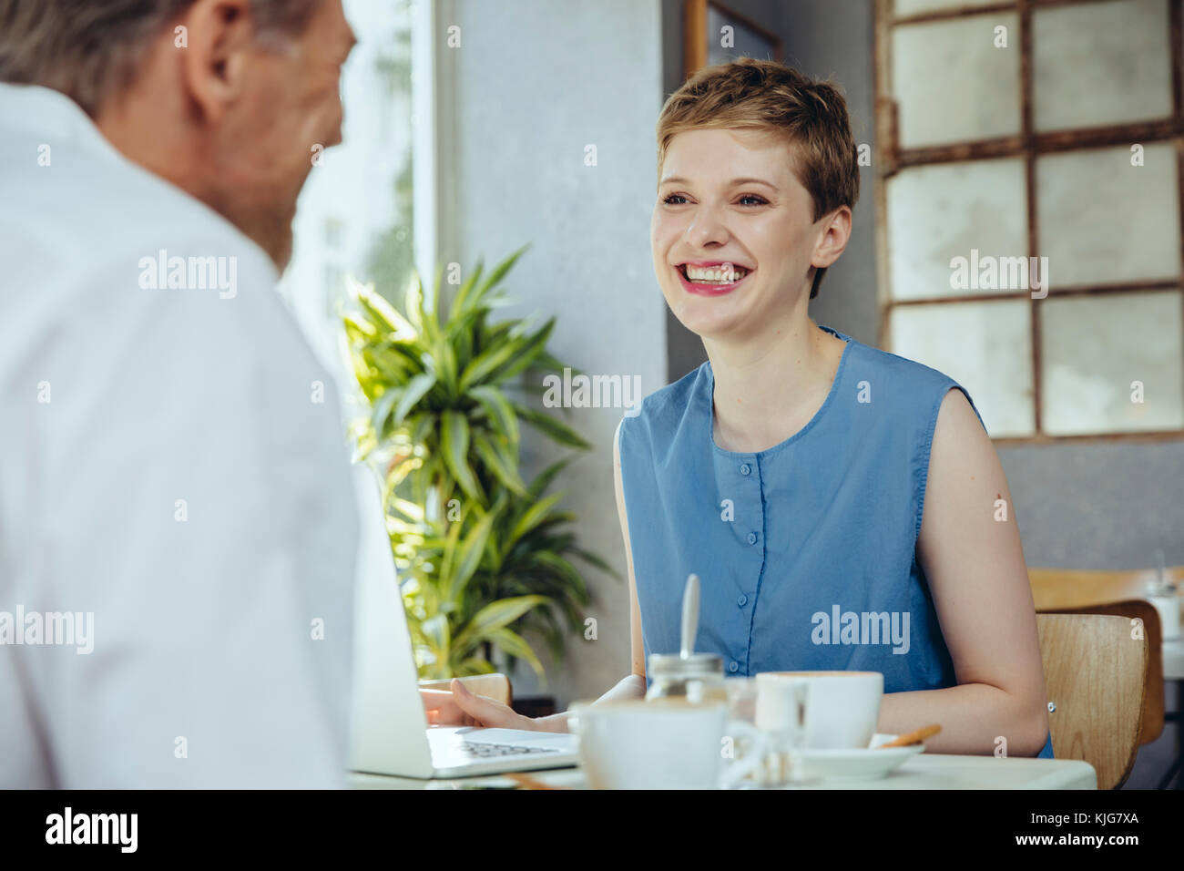 Geschäftsmann und Geschäftsfrau mit einem Treffen in einem café Stockfoto