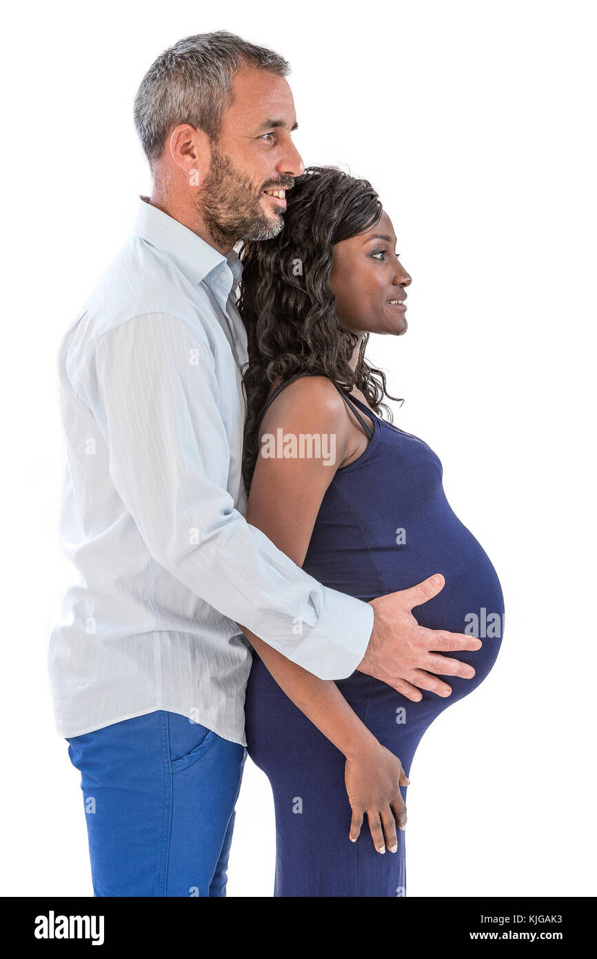 Paar mit Händen auf baby Bauch der schwangeren Frau in einem weißen Hintergrund Stockfoto