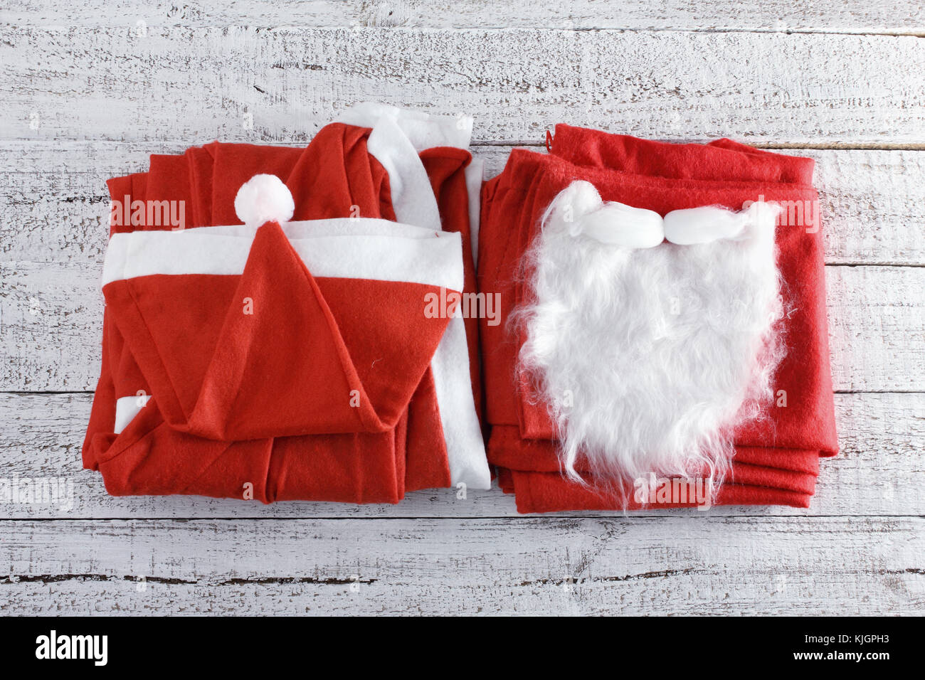 Santa claus Kostüm auf Holz- Hintergrund Stockfoto
