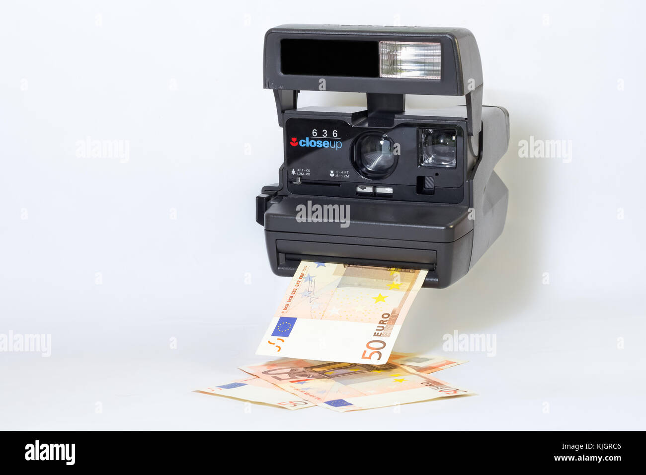Alte Kamera aus drucken Bargeld, Geld verdienen Konzept Stockfoto