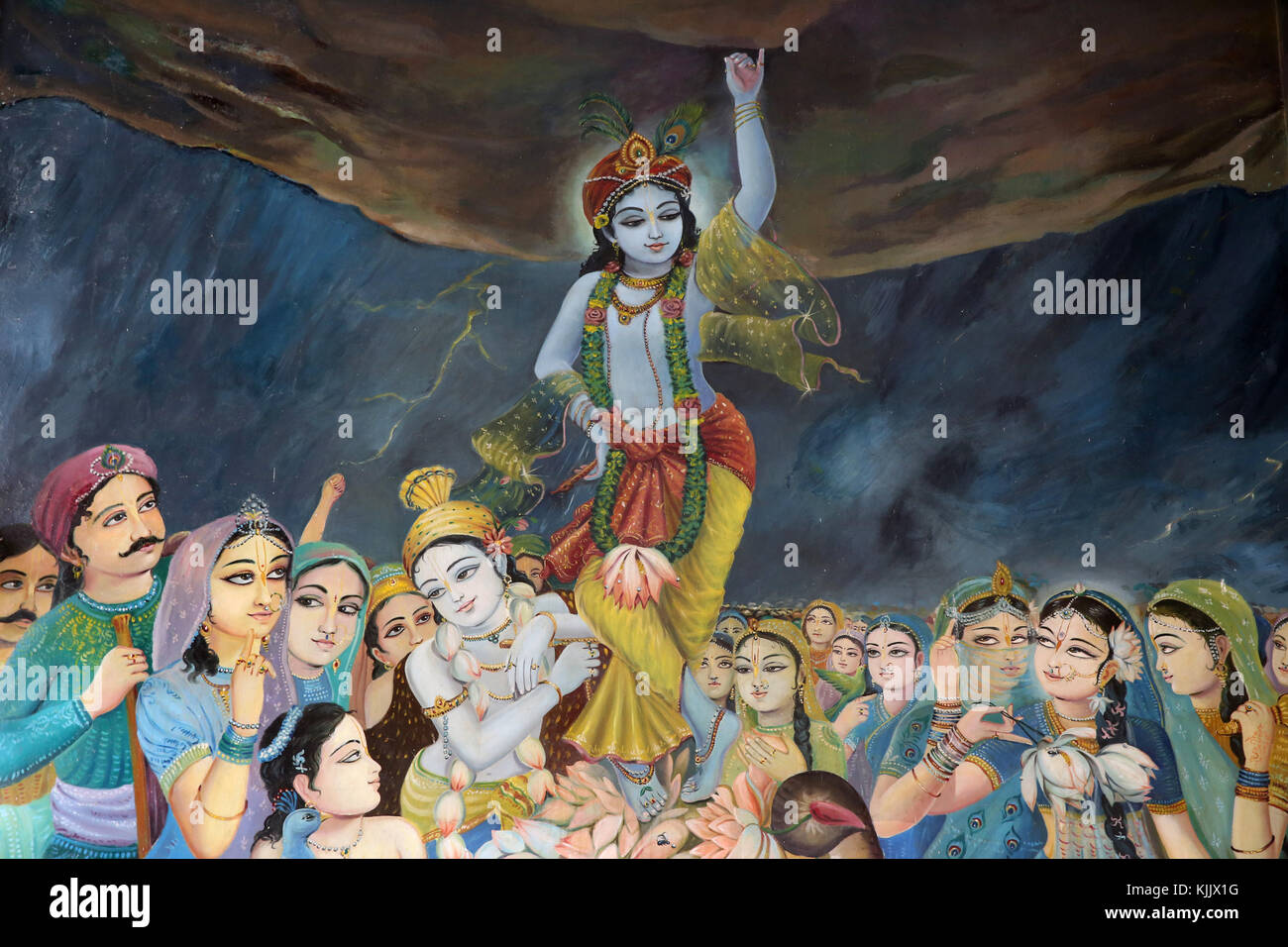 Gemälde der Darstellung Hindu Gott Krishna anheben Goverdan Hill. Vrindavan. Indien. Stockfoto