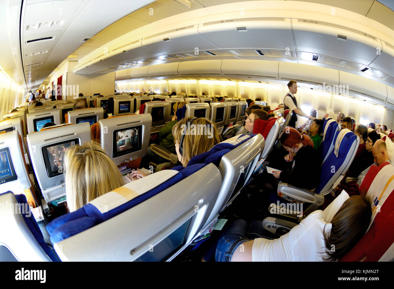 Passagiere In Der Economy Class Sitze Sitzen Beobachten