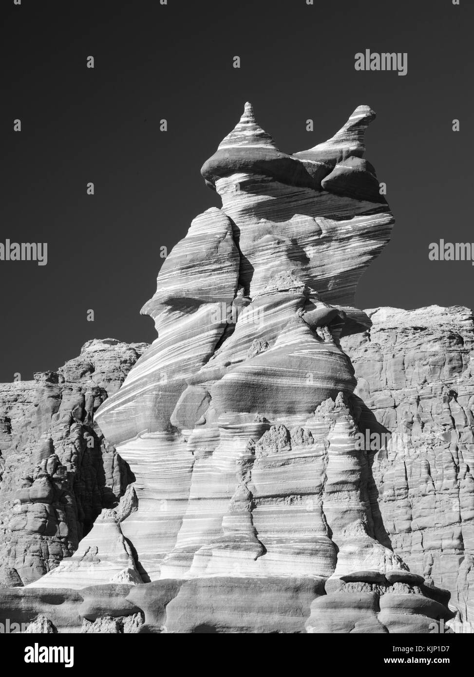 Morgen Blick auf die Hopi Clown, ein Moenave Sandstein Bildung in der Adeii Echii Klippen von Coconino County, Arizona. Stockfoto