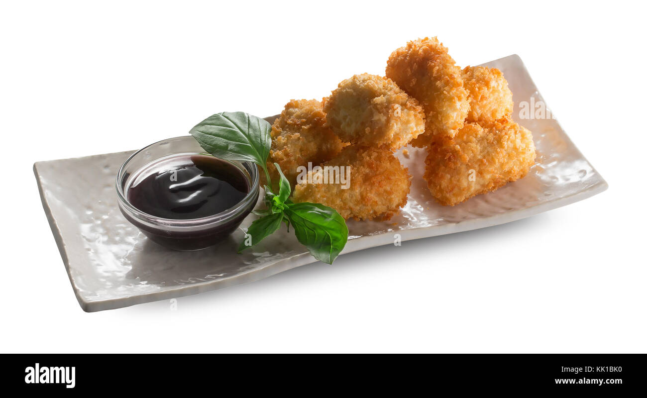 Chicken Nuggets mit Soja Sauce auf einer Platte. Stockfoto