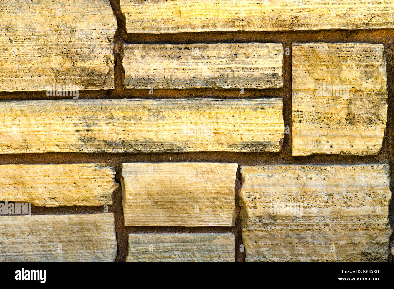 Stein Ziegel Muster Hintergrund mit Backsteinen ausgerüstet, die zusammen Stockfoto