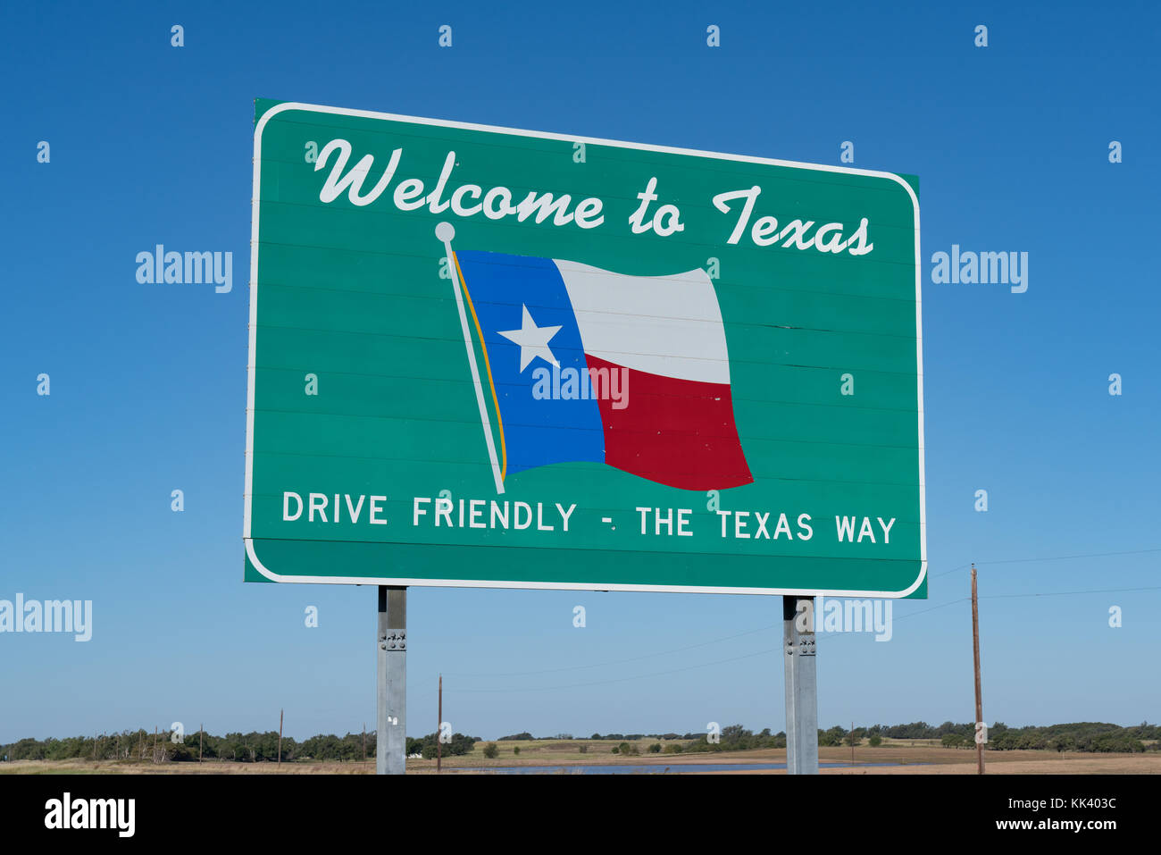 Willkommen in Texas Zeichen auf der Straße an der Grenze Stockfoto