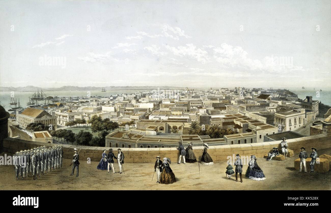 Chromolithographie mit dem Titel „Panorama de San Juan de Puerto-Rico“, die eine Gruppe von Menschen auf einem Gebäude zeigt, darunter eine Gruppe von Militärs, die spanischen Kolonialgebäude der Stadt und die Bucht, die im Hintergrund sichtbar ist, San Juan, Puerto Rico, 1860. Aus der New York Public Library. Stockfoto
