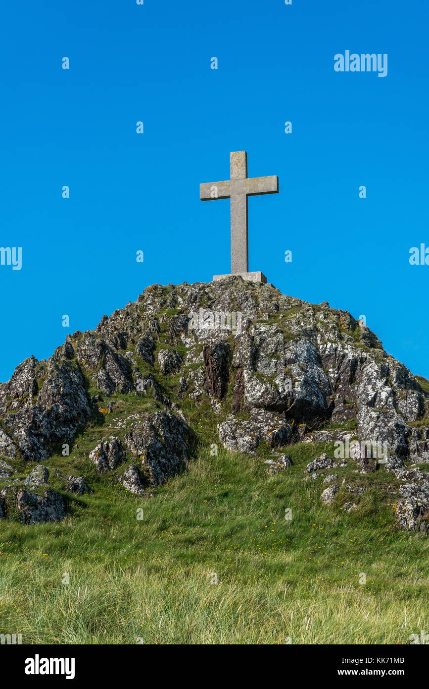 St Dwynwens Kreuz auf Ynys Llanddwyn auf Anglesey, Wales, Großbritannien Stockfoto