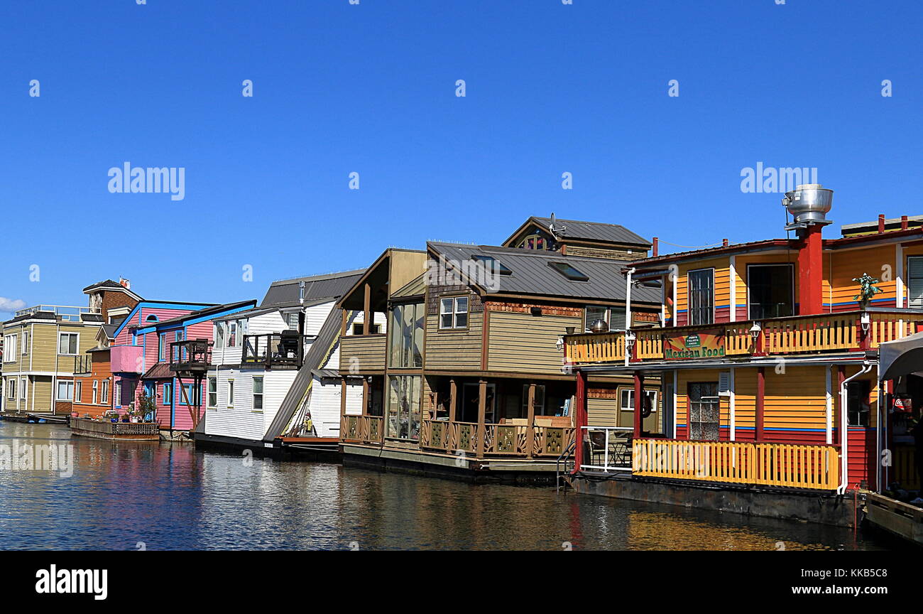 Victoria, Kanada Victoria Inner Harbour, Fisherman's Wharf. Wohngebiet mit schwimmenden Häuser, Boote, Piers, Geschäfte und Restaurants. Stockfoto