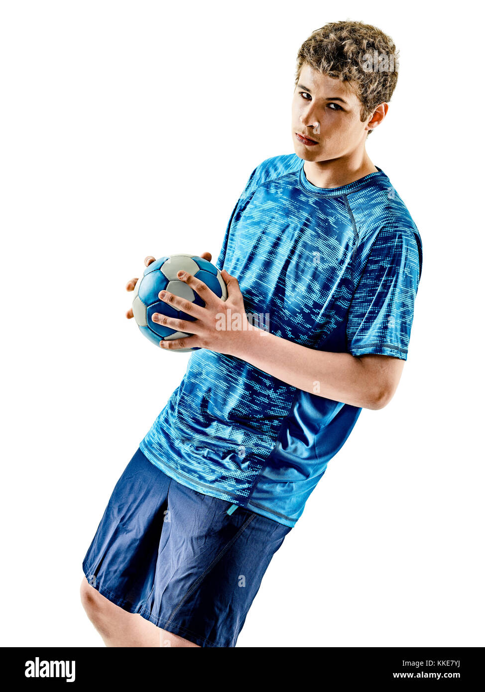 eine kaukasische Handball Spieler Teenager Boy im Studio isoliert auf weißem Hintergrund Stockfoto